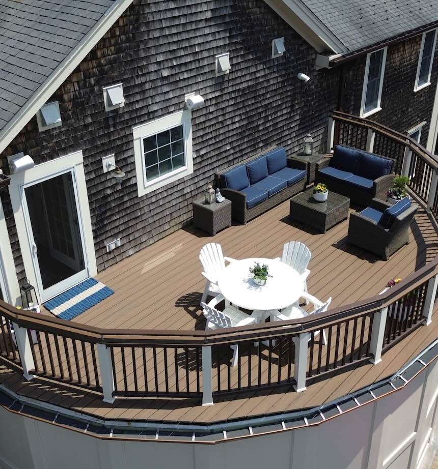 Aerial view of deck repair with railing and outdoor living spaces in worcester ma