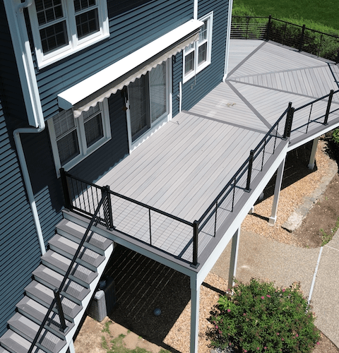 Aerial view of elevated pvc deck with cable railing in worcester ma