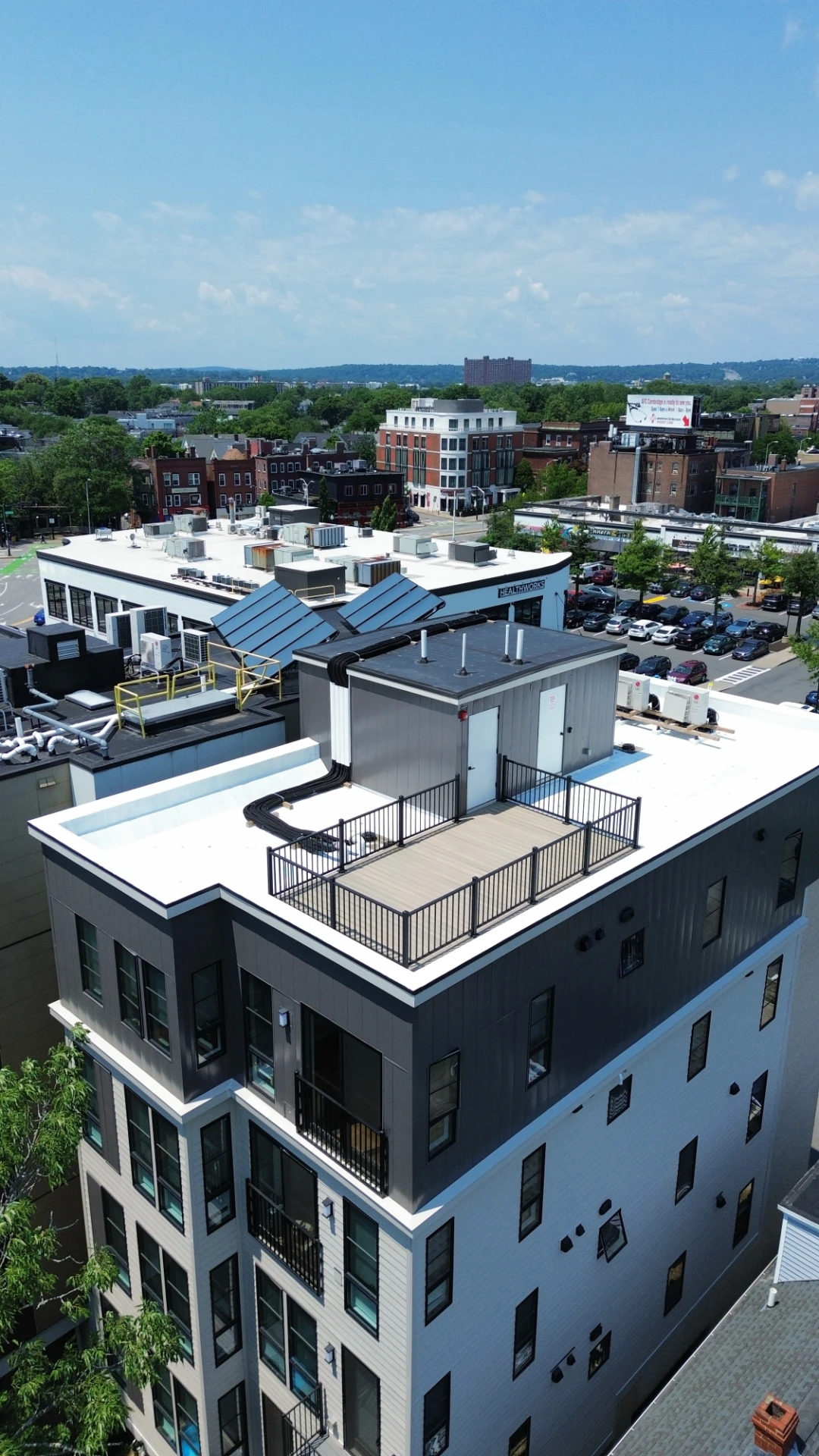 Commercial decking on the apartment building rooftop deck with city view in worcester ma