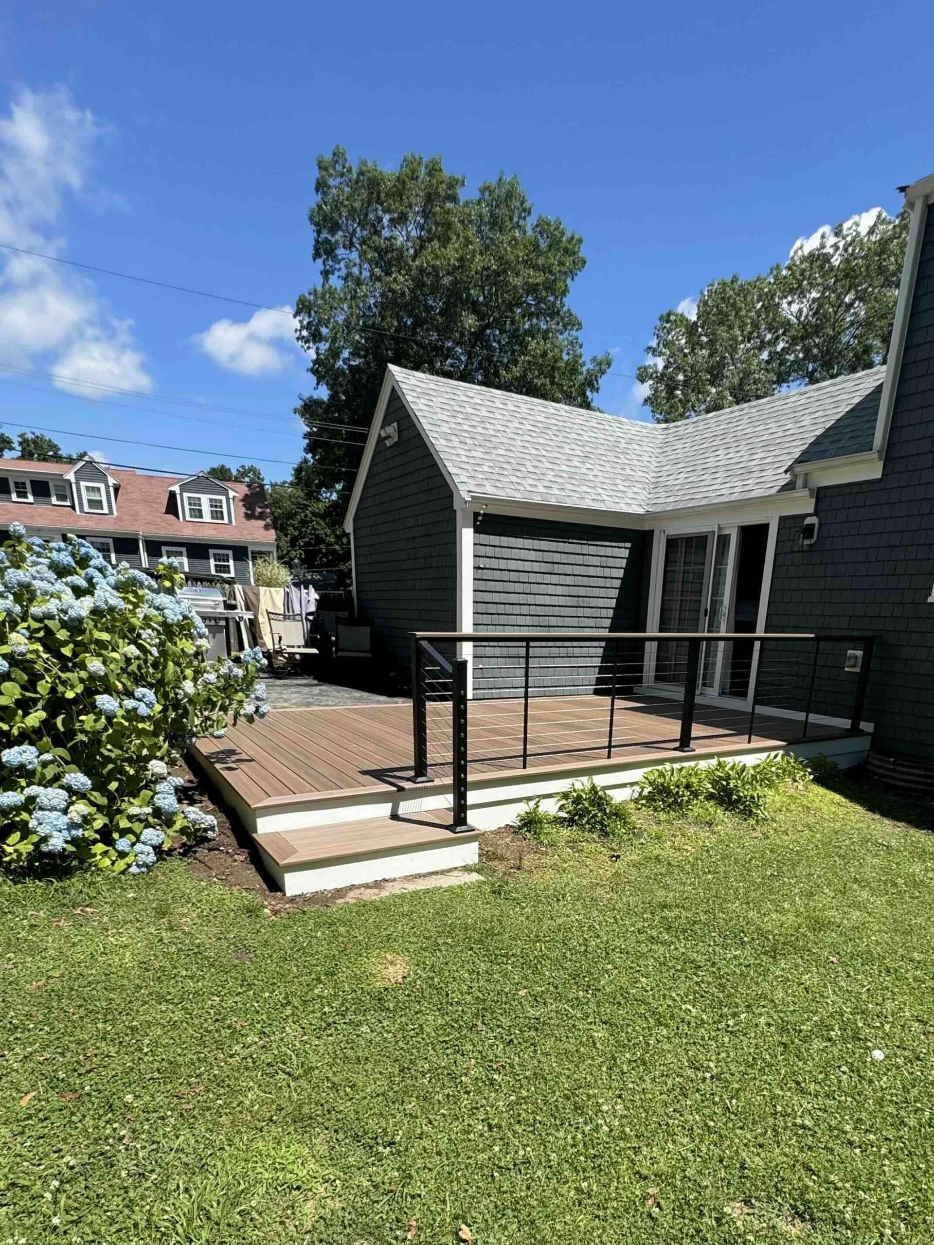 Commercial ground level deck with cable railing in worchester ma