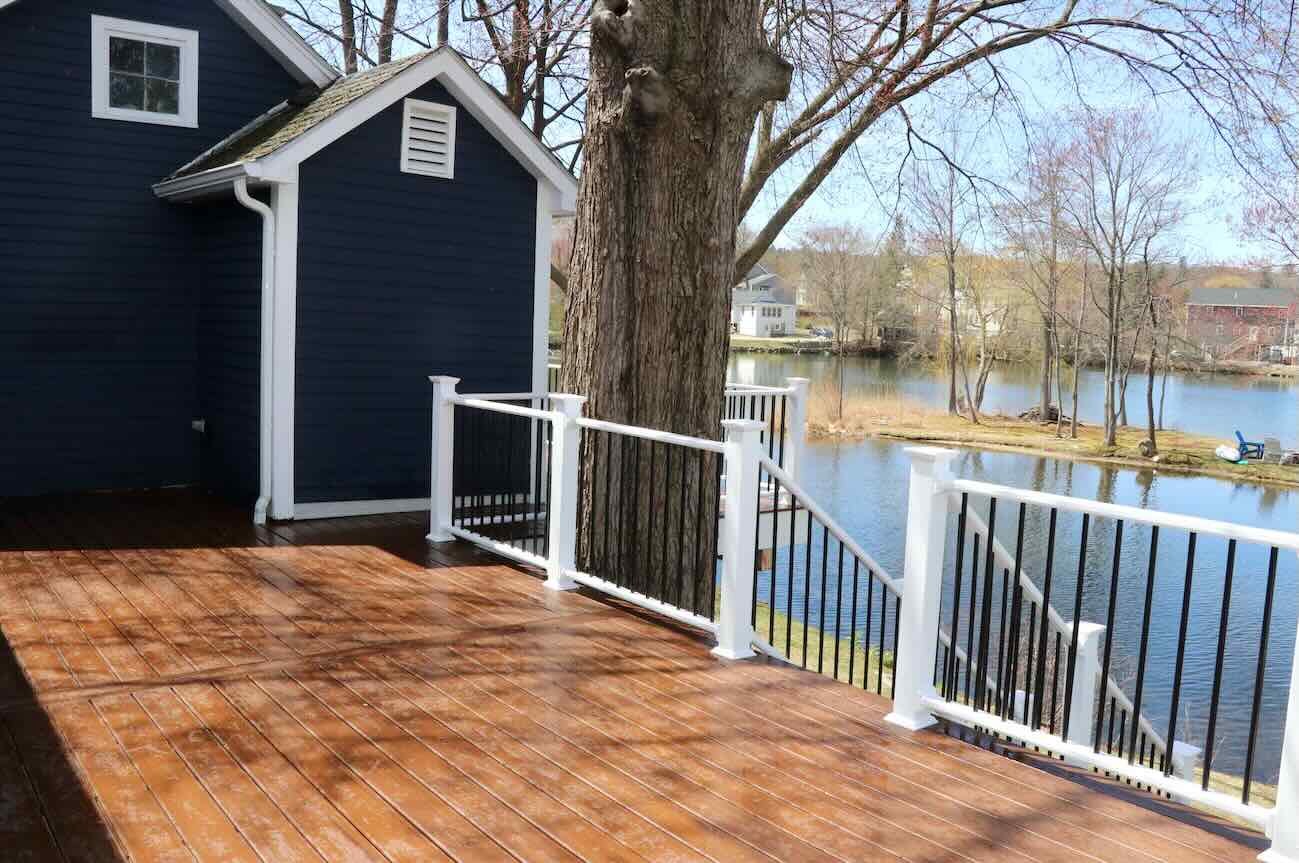 deck-repair-installation-with-railing-on-the-modern-house-beside-the-lake-in-worcester-ma.jpg