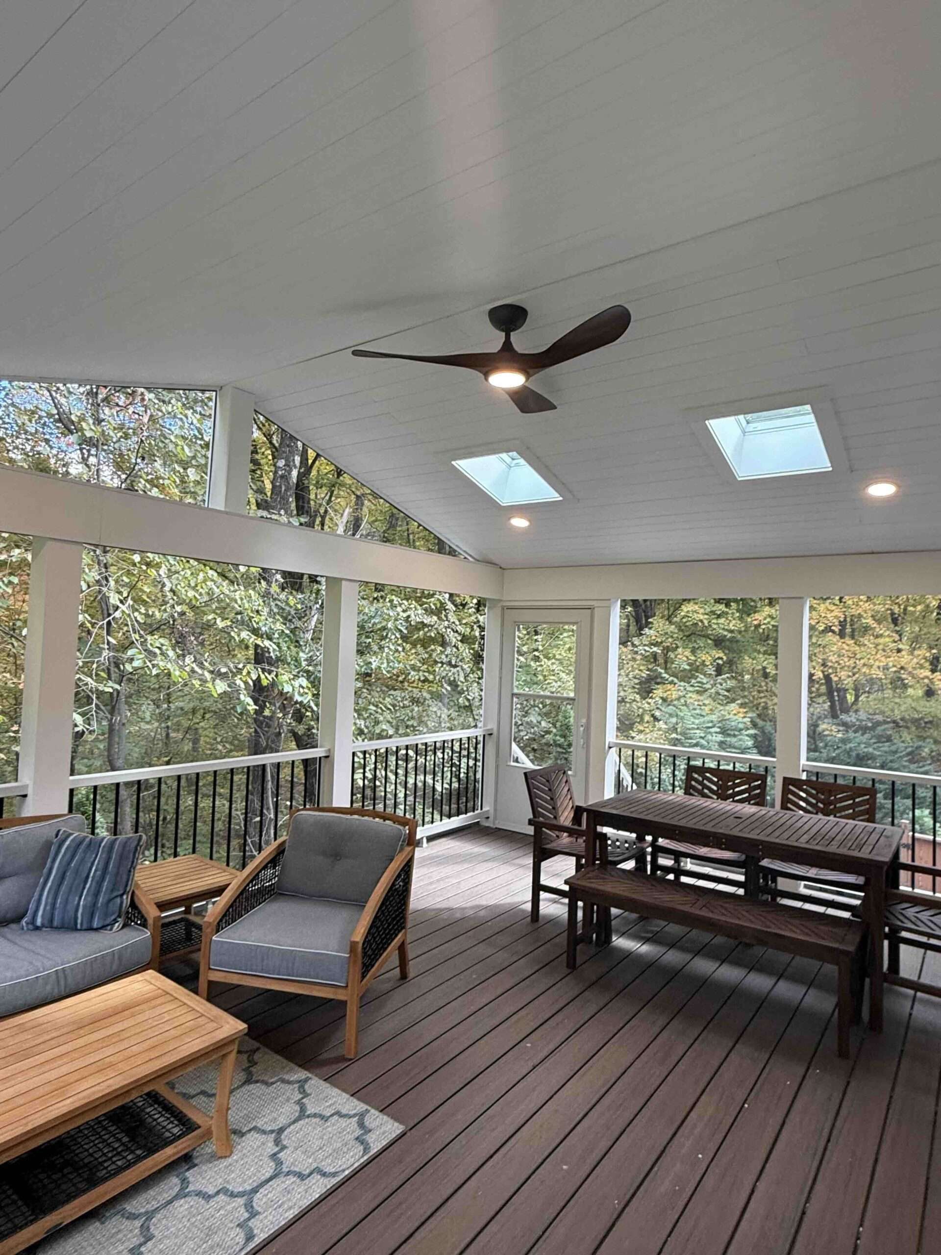 Interior of the screened in porch installation with furnitures in worcester ma