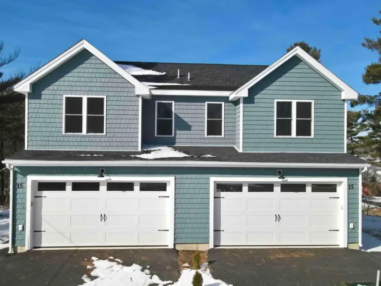 Residential siding installation on the house with snow in worcester
