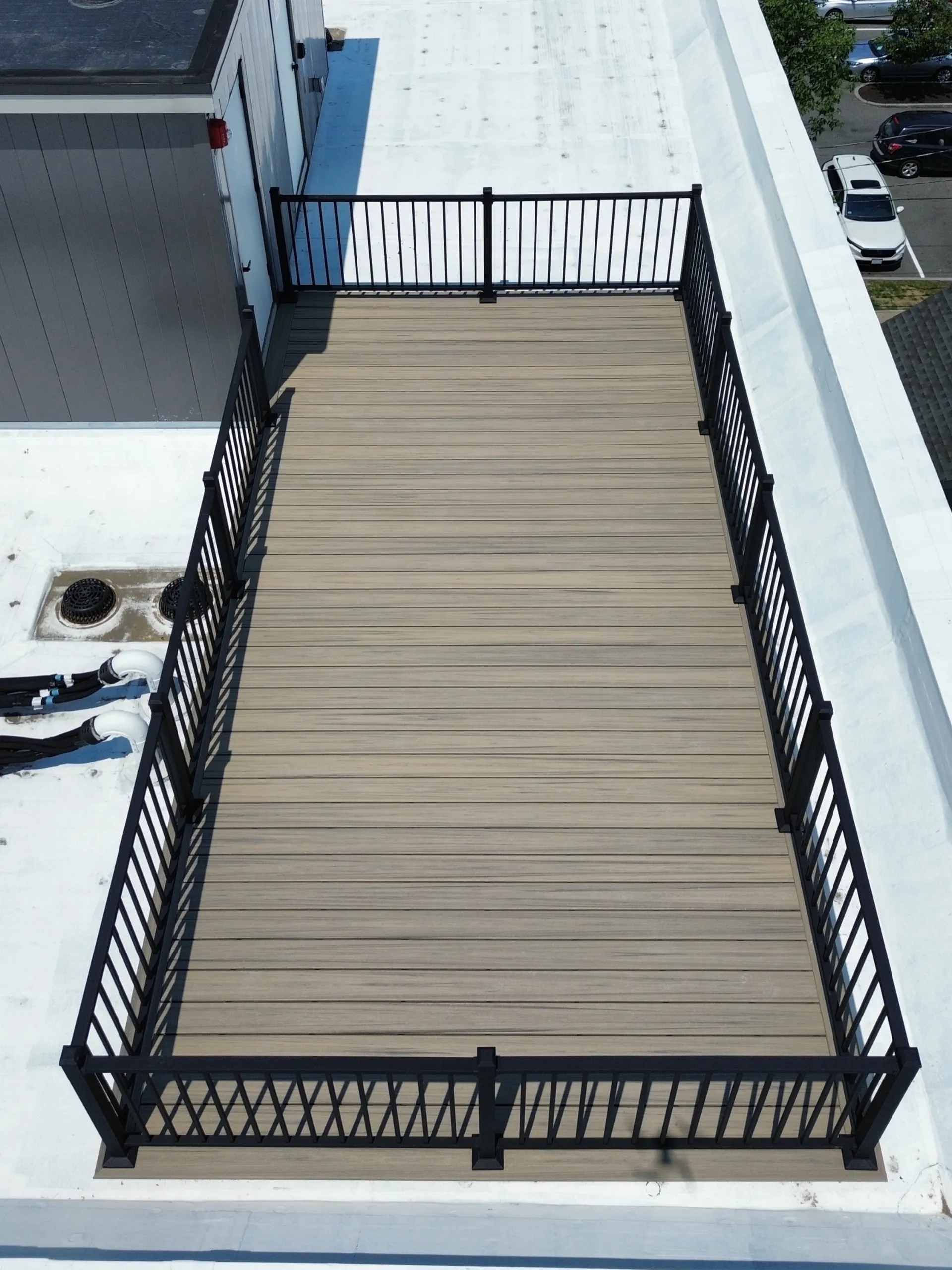 Roof deck wood black railings close up