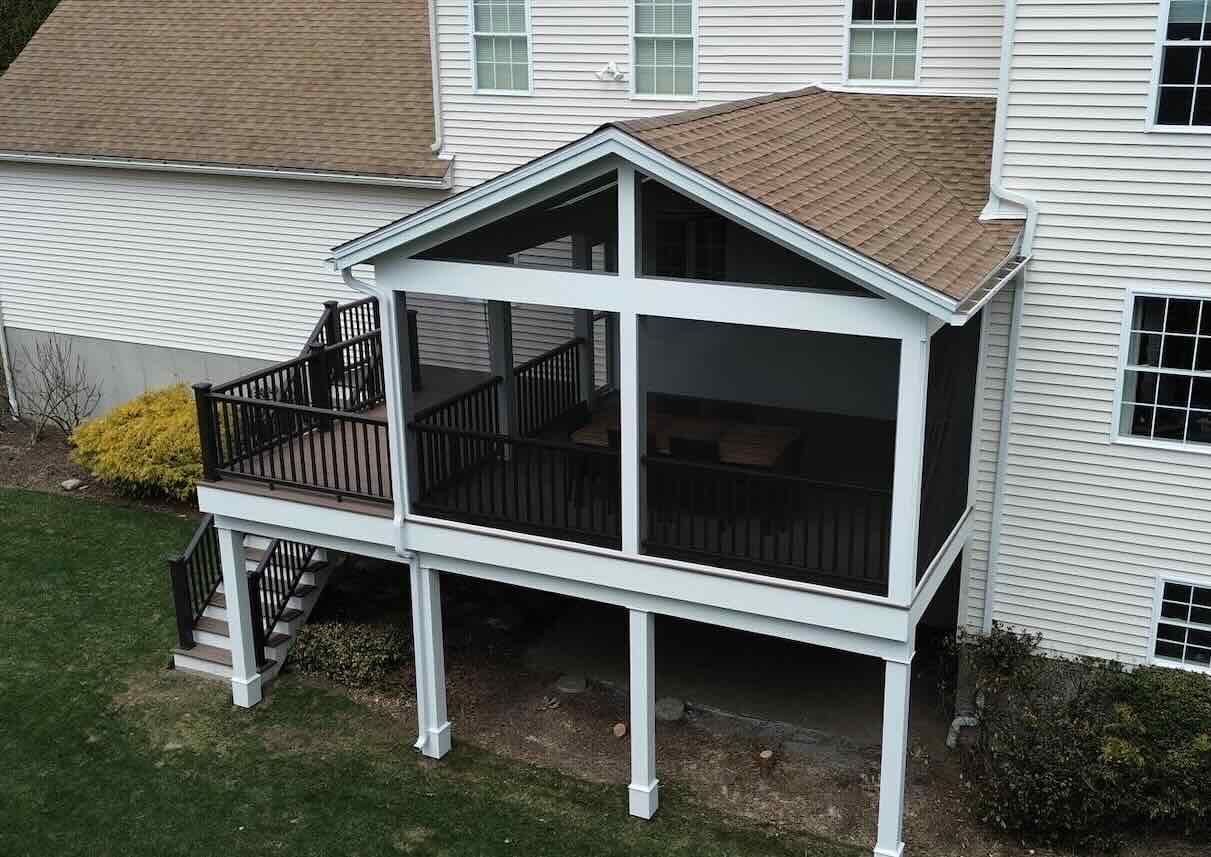 screened-in-porch-installation-on-the-elevated-residential-deck-with-black-railing-in-worcester-ma.jpg